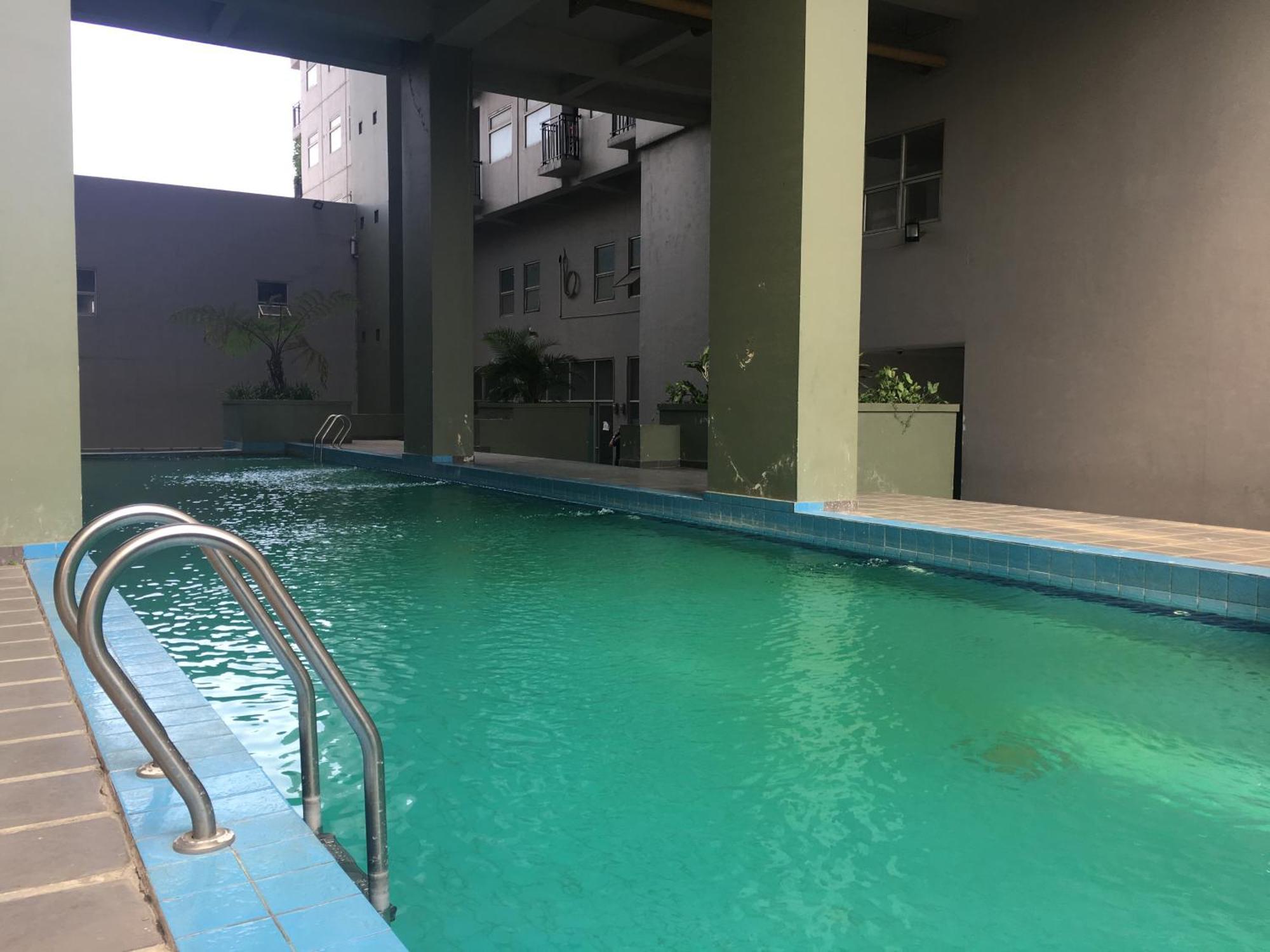 Apartemen Bohemian Beauty At Grand Afrika By Travelio